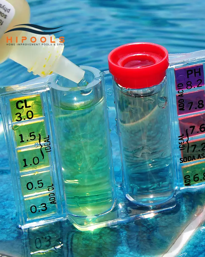 A person carefully pouring chlorine granules into a swimming pool for maintenance