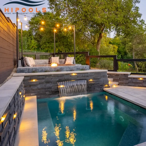 Designer infinity pool with fire features and LED lighting.