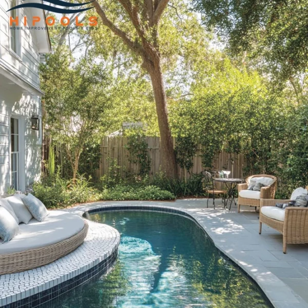 DIY Charm: Repurposed urn waterfall in a cozy backyard oasis