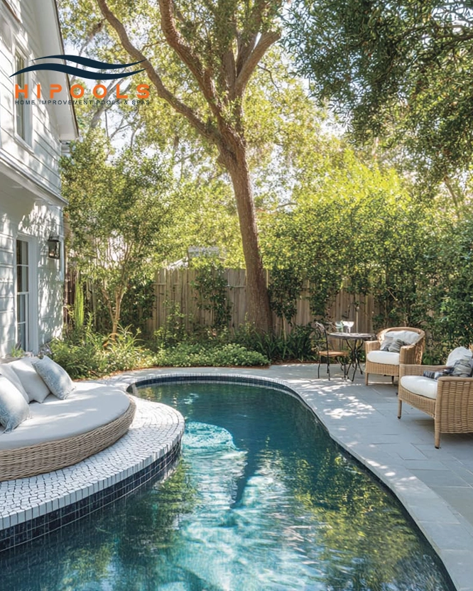 DIY Charm: Repurposed urn waterfall in a cozy backyard oasis